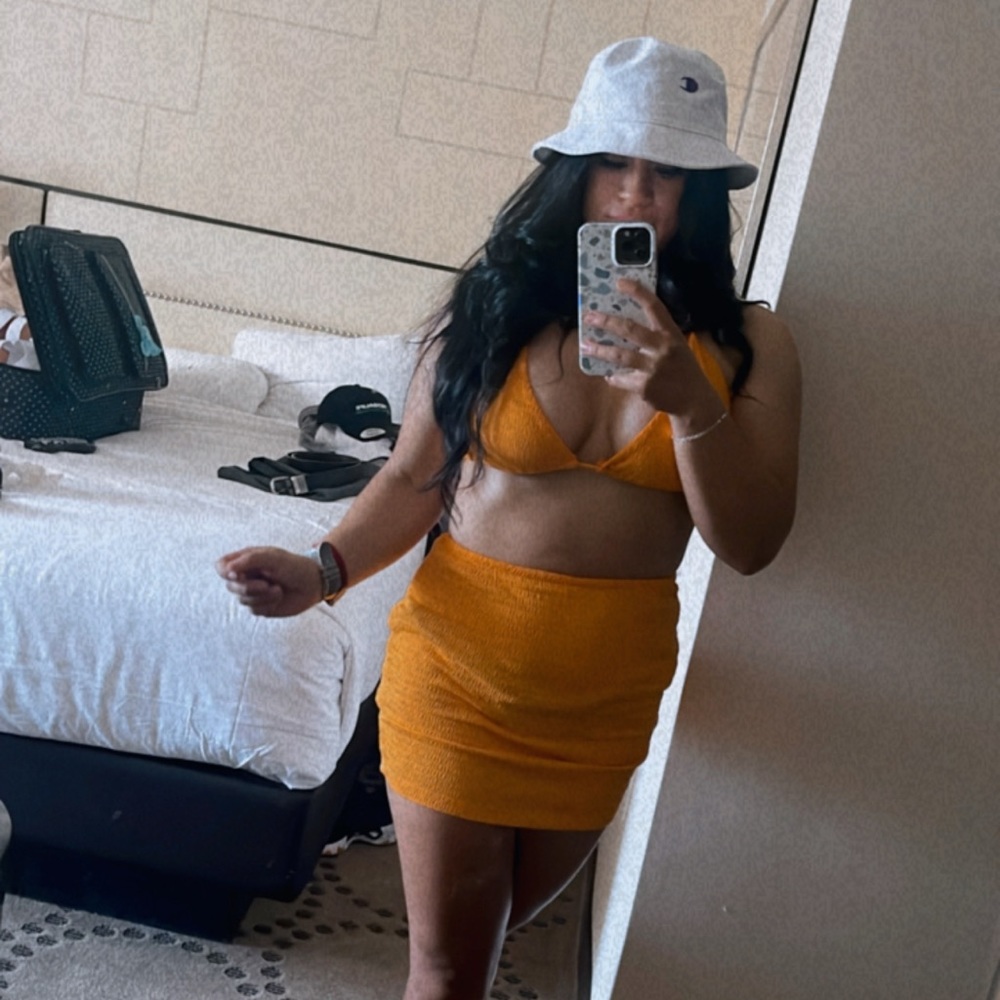 Two piece orange suit